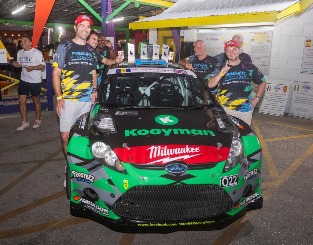Top 2wd for an unparalleled seventh time, Barry Mayers (front left) and co-driver Moishe Steinbok celebrate with M & M Racing personnel, courtesy RB26/Bhajan Rally Media