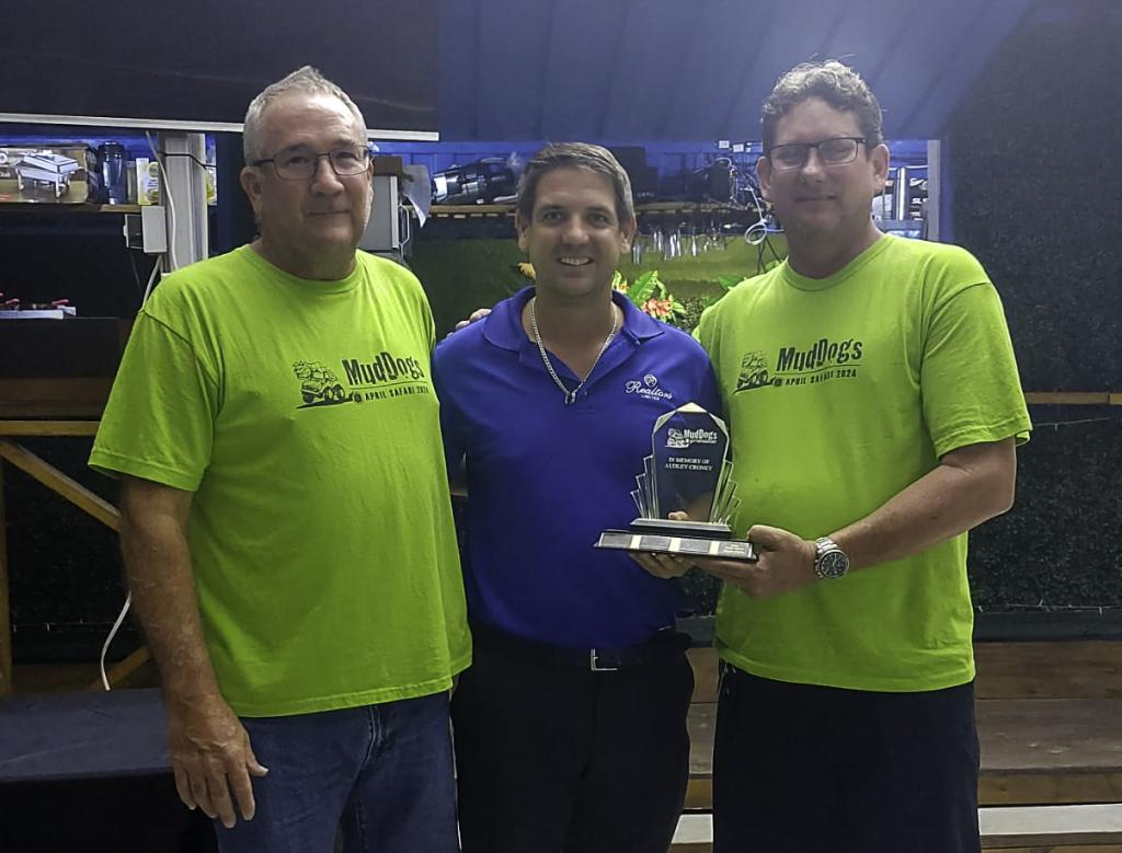 courtesy Barbados Rally Club, Winners of the All Terrain/Rock Oil MudDogs April Safari, Leslie Alleyne (right) and Chris O’Neal accept the Audley Croney Memorial Trophy from Andrew Croney