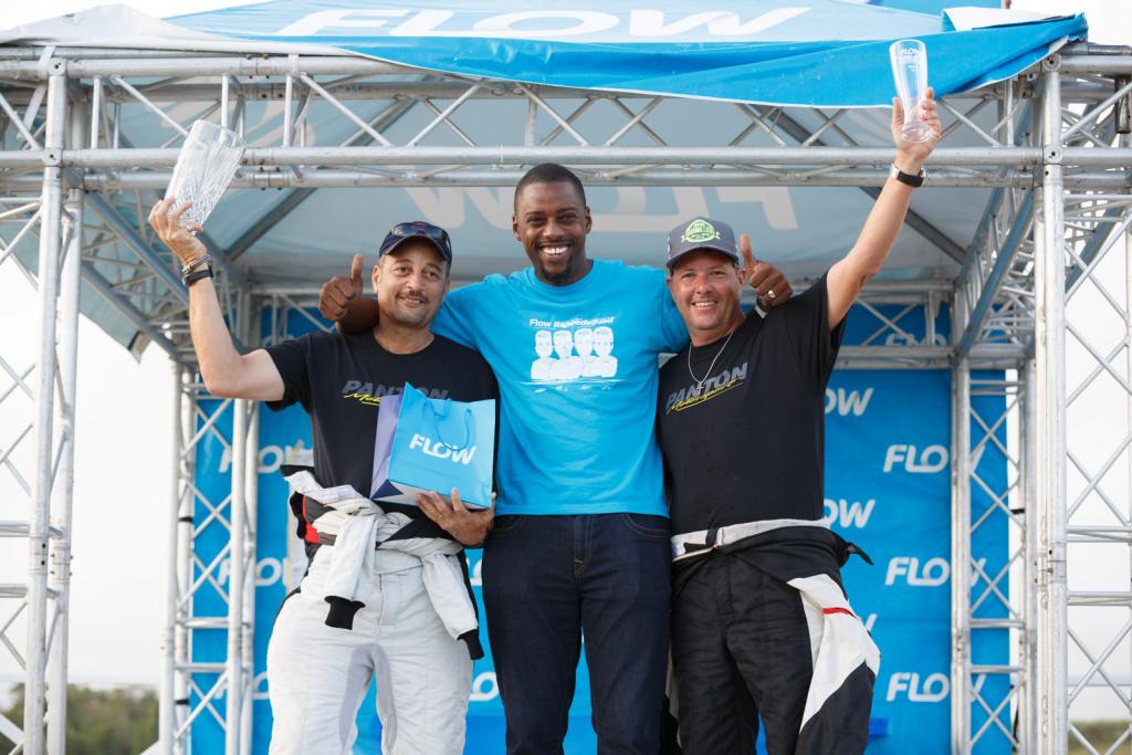 Jeffrey Panton (right) and Michael Fennell Jnr flank Flow MD Jenson Sylvester after they won Flow King of the Hill in May - can they win again in the double-header final of the Flow SuperSprint Series?