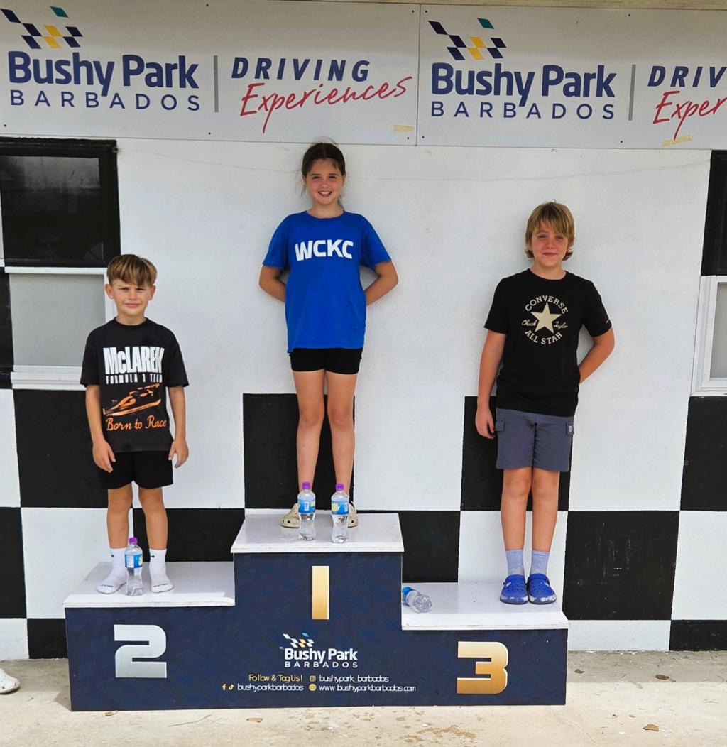 Ava Mayers on the 60cc podium, flanked by Edward Norris (left) and Finn Cox. Pictures courtesy Barbados Karting Association/Image Vault