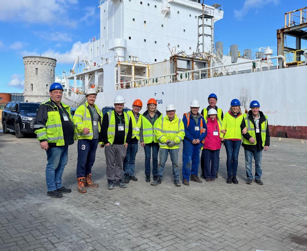 The UK loading crew loading crew on the docks in Southampton, all smiles despite temperatures in single figures